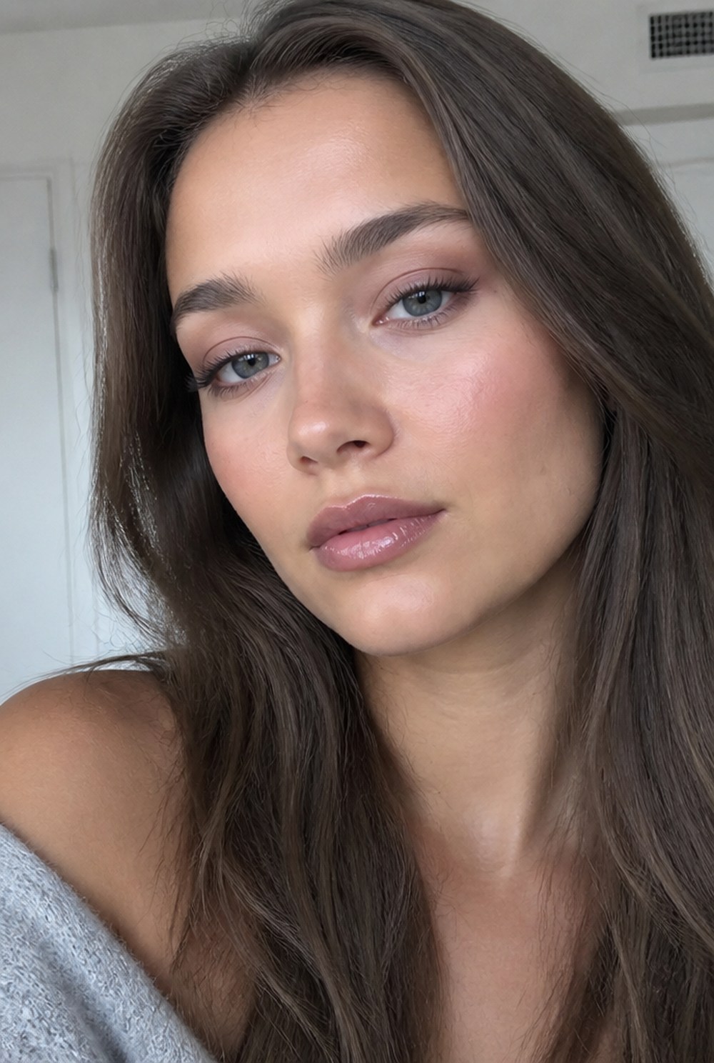 A woman's face in soft natural light